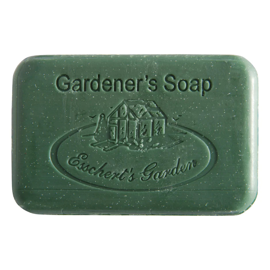 Green bar of soap with 'Gardener's Soap' and 'Eschert's Garden' branding on a white background