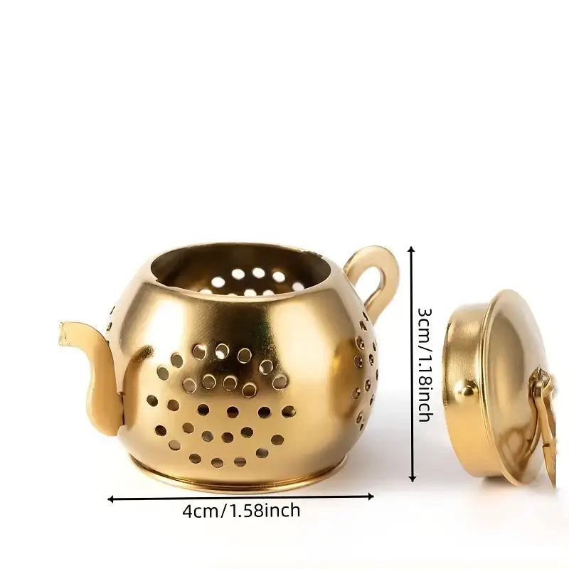 Gold-colored tea infuser with dimensions indicated on a white background